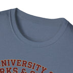 University of Barks & Spirits T-Shirt – "In Dogs We Trust" Crest Tee