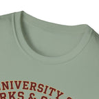University of Barks & Spirits T-Shirt – "In Dogs We Trust" Crest Tee